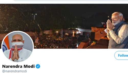 लॉकडाउन : पीएम मोदी ने बदली ट्विटर-फेसबुक पर प्रोफाइल फोटो, गमछे को बनाया मास्क