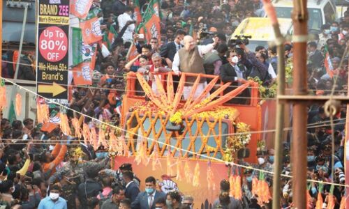 बंगाल में गृहमंत्री का रोड शो, कहा - जनता ममता सरकार से मुक्ति चाहती है