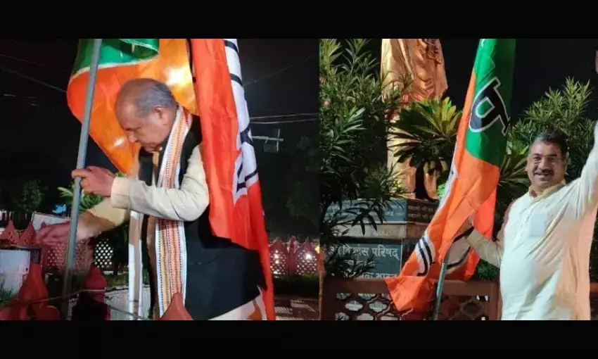 केंद्रीय मंत्री नरेंद्र सिंह तोमर और हितानंद शर्मा ने बैठक से पहले चौराहों पर लगाए पार्टी के झंडे