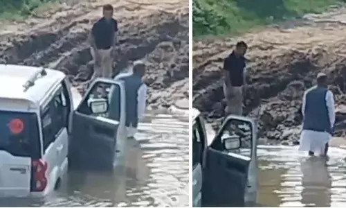 BJP MLA Sukhram Chaudhary: नाले में फंसे बीजेपी विधायक सुखराम चौधरी, कुछ इस प्रकार से पार किया नाला, देखें वीडियो