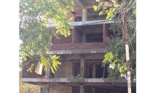 कूटरचित दस्तावेज से बनाई जा रही बहुमंजिला इमारत